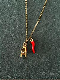 Collana con corno portafortuna e mano