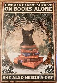 Targa in metallo con gatto e libri