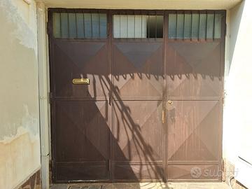 porta battente a 3 ante per garage