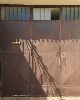 porta battente a 3 ante per garage