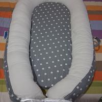 Riduttore culla per neonato/a