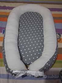 Riduttore culla per neonato/a