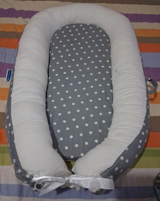 Riduttore culla per neonato/a
