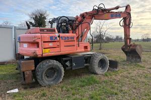 Escavatore gommato FH EX135W