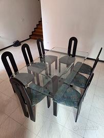 tavolo di cristallo e 8 sedie