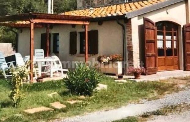 Trilocale con giardino privato e posto auto riserv