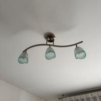 Lampadario in acciaio e vetro