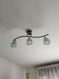 Lampadario in acciaio e vetro