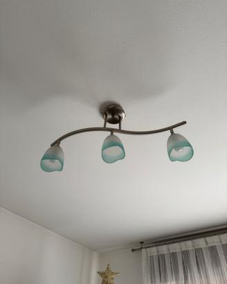 Lampadario in acciaio e vetro