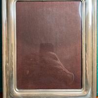 Cornici in argento e materiale vario