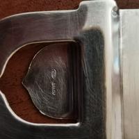 Apribottiglie in argento 800