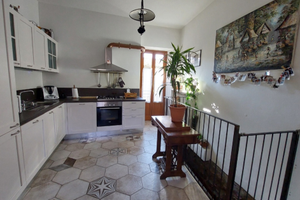 EUPILIO Appartamento piano terra con cantina e box