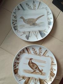 Coppia piatti caccia Fornasetti