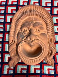 Coppia di maschere in terracotta