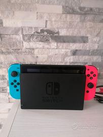 Nintendo Switch 1 NUOVA con controller ed un gioco