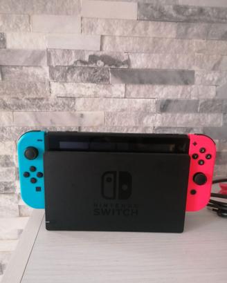 Nintendo Switch 1 NUOVA con controller ed un gioco