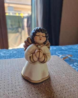 thun Angelo che prega