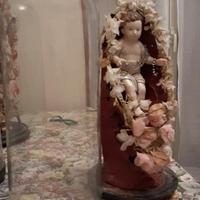 Bambinello in cera in campana