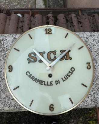 Orologio pubblicitario caramelle Sica