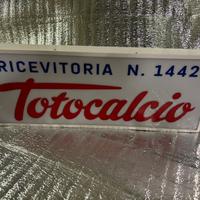 Insegna luminosa toto  calcio