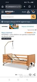 Letto elettrico con sponde e alzamalati ad altezza