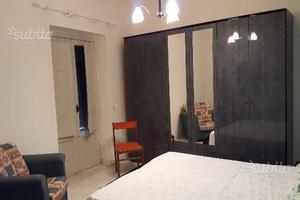 Trilocale su due piani arredato