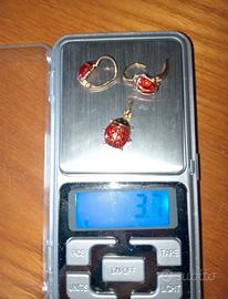 Orecchini e ciondolo in oro 14kt