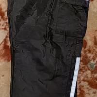 Pantaloni antipioggia per moto