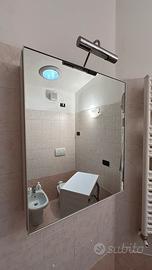 Spechio contenitore con luce