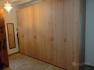 Armadio 7 ante rovere chiaro – Grande capienza
