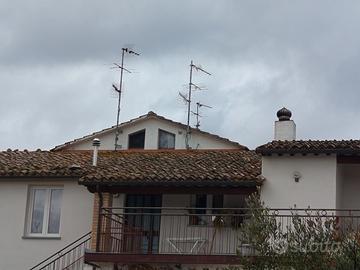 Appartamento con terreno e capanni