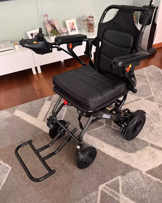 Sedia a rotelle elettrica