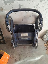 Carrozzina porta infante