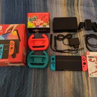 Nintendo Switch Oled + accessori + giochi