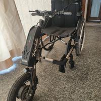 Triride con sedia a rotelle