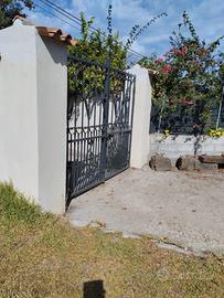 Terreno con casa