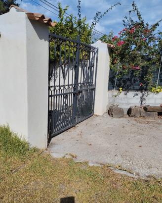 Terreno con casa
