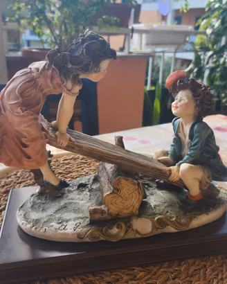 Bambini sulla Altalena Giuseppe Armani Capodimonte