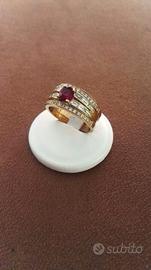 anello oro giallo con diamanti e rubino