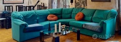 Divano angolare verde  con  letto matrimoniale 