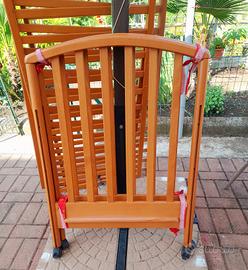 Lettino in legno con materasso