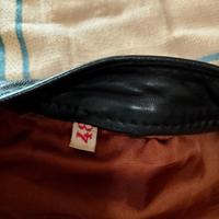 tuta da moto e stivali 