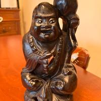 Budda in legno con lampada