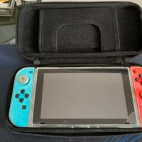 Nintendo switch + custodia + gioco