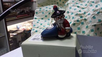 Babbo natale carabiniere di thun su motoslitta