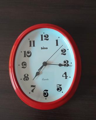 Orologio da parete ovale rosso