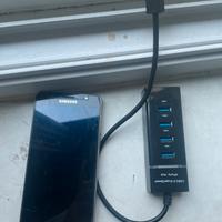 Telefono Samsung , con una mini prolunga