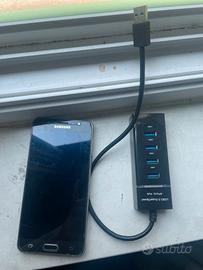 Telefono Samsung , con una mini prolunga