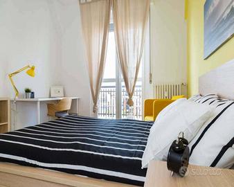 Stanza in appartamento di 101 m² a Corsico