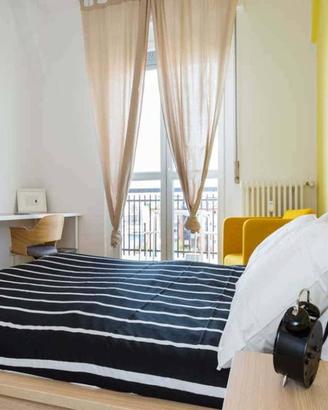 Stanza in appartamento di 101 m² a Corsico